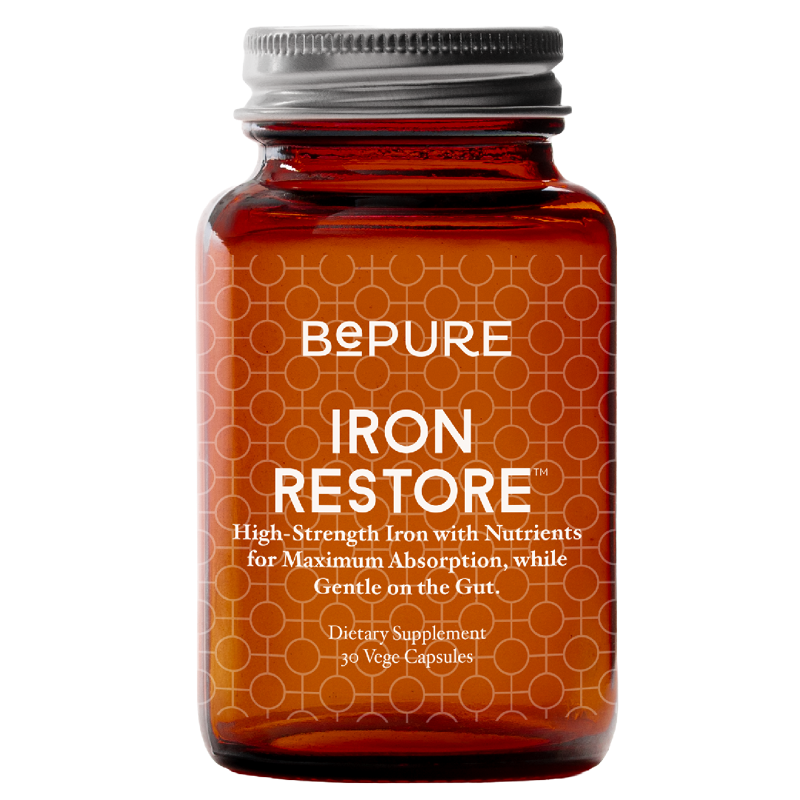 Bottle of BePure Iron Restore supplement on a white background
