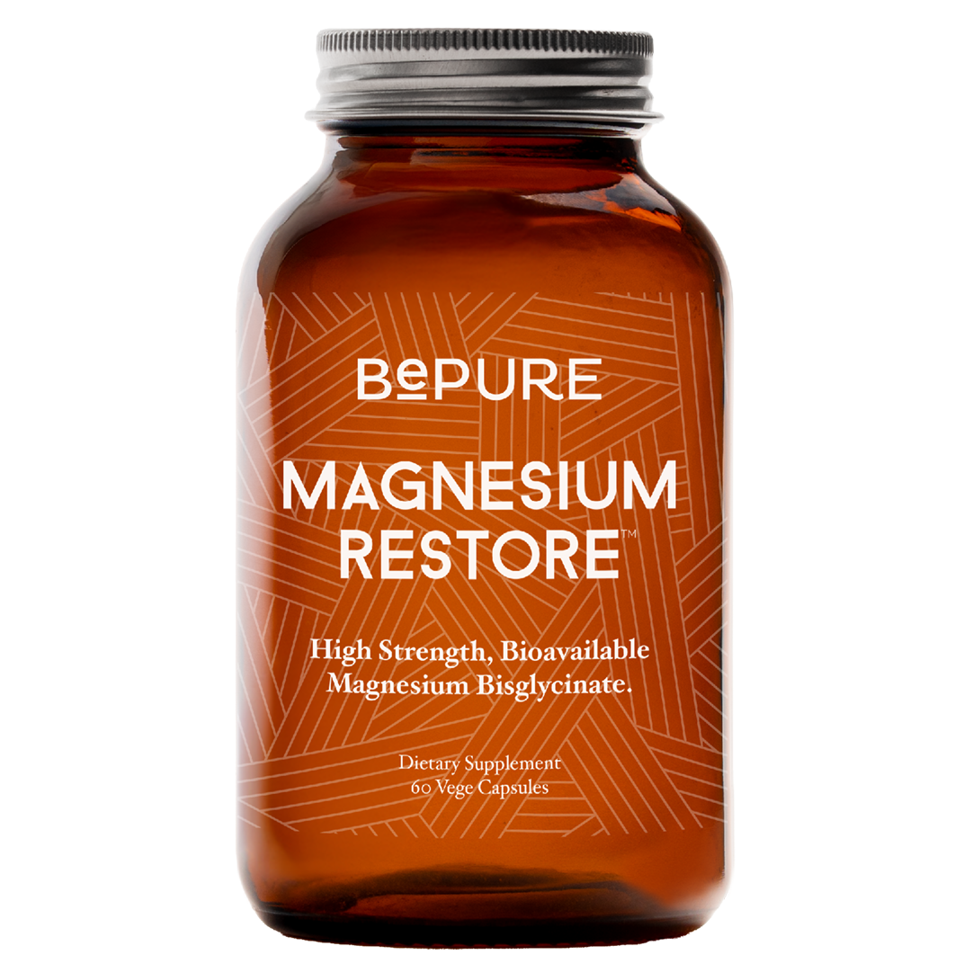 Brown supplement bottle labeled 'Bepure Magnesium Restore' on a white background