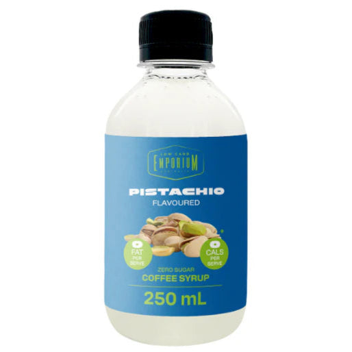 Bottle of pistachio flavored coffee syrup with a blue label on a white background