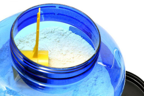 Open Protein Container with yellow scoop