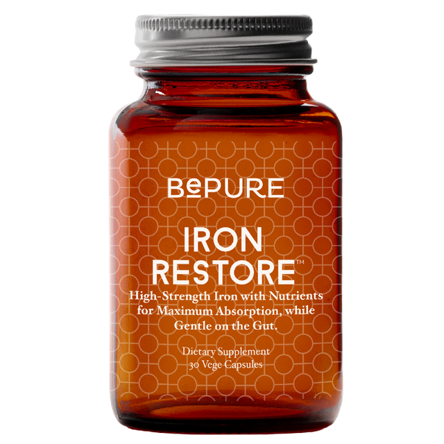 Bottle of BePure Iron Restore supplement on a white background