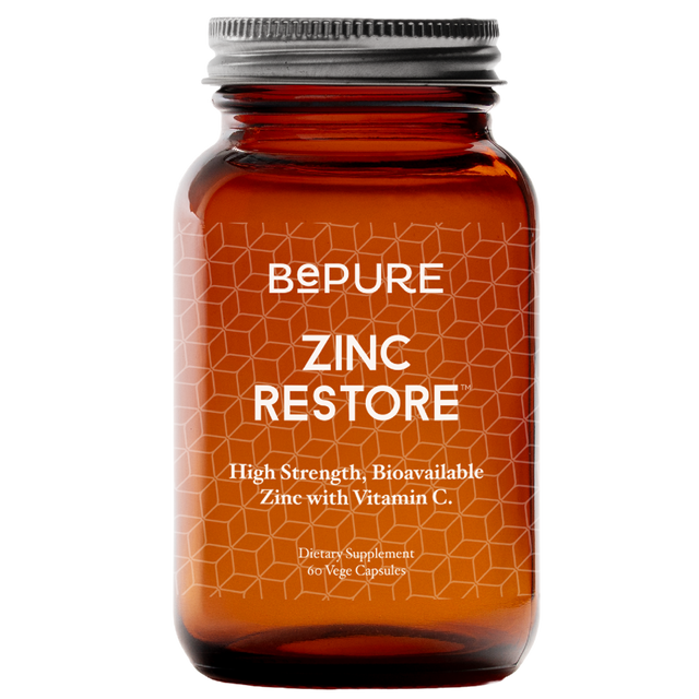 Orange supplement bottle labeled 'Bepure Zinc Restore' on a white background