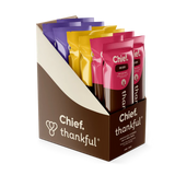 Box of Chief Thankful snack packs with colorful packaging on a white background