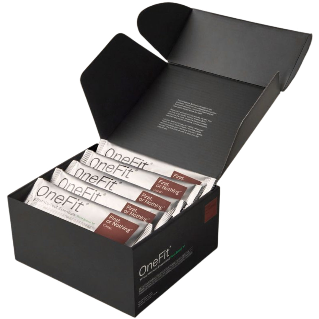 Open black box containing OneFit product packages on a white background