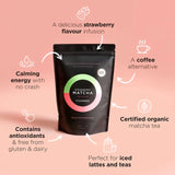 Strawberry Matcha tea package with features on a pink background