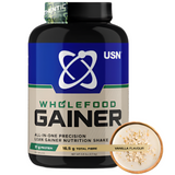 A bottle of USN Wholefood Mass Gainer in vanilla flavor, with the label showing the product name and the vanilla flavoring.