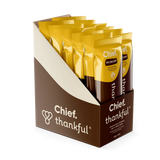 Packaging of Chief Thankful products with yellow bags and brown box on a white background