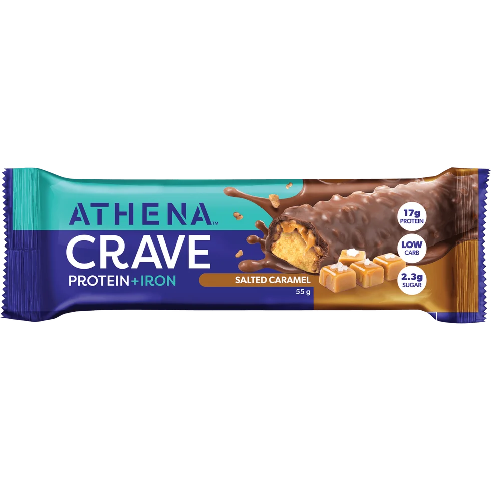 A packaged Athena Crave Protein + Iron bar in Salted Caramel flavor, shown on a plain white background. The wrapper is teal and dark blue with a large photo of a chocolate-coated caramel bar and caramel cube graphics.