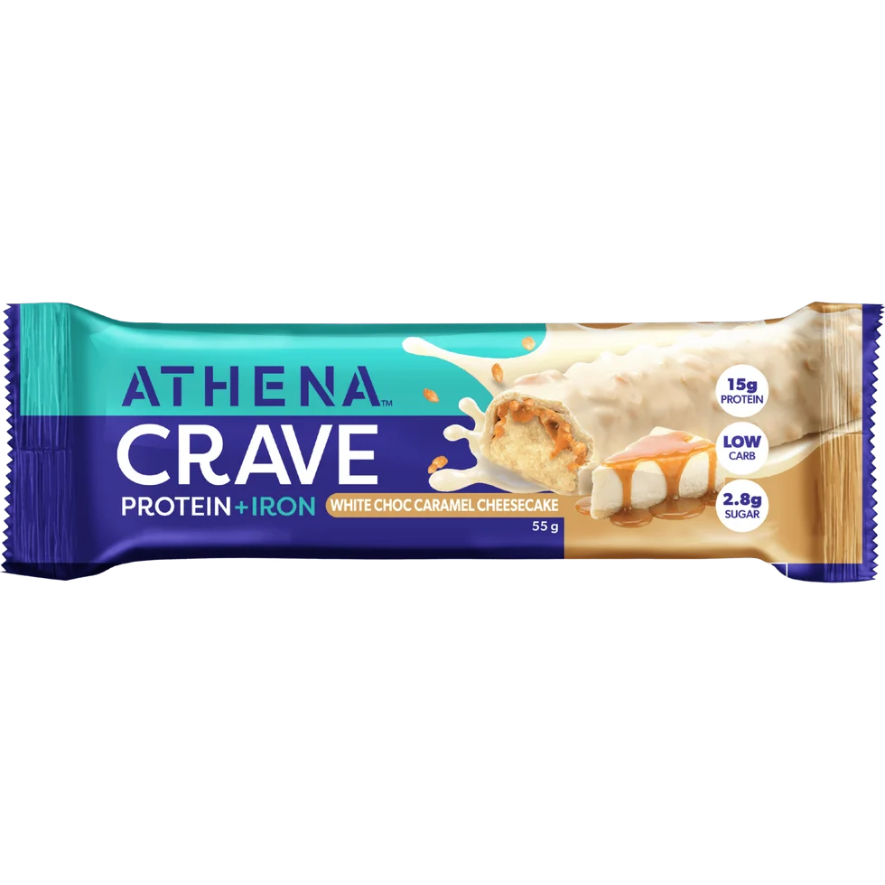 A single Athena Crave protein bar in its wrapper, featuring a white chocolate caramel cheesecake flavor. The packaging has a teal and dark blue design with a depiction of the bar broken open to show the white chocolate and caramel filling.