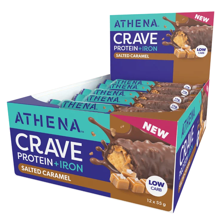 A box of Athena Crave Protein + Iron protein bars in Salted Caramel flavor, shown on a clean white background. The packaging features a teal and brown design with a chocolate-covered caramel bar illustration and a pink 'NEW' banner.