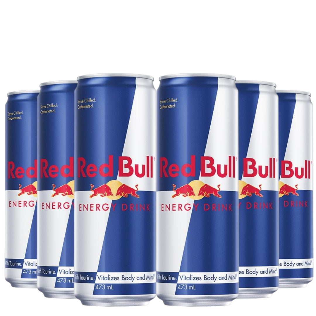 Multiple cans of Red Bull energy drink arranged in a row on a white background